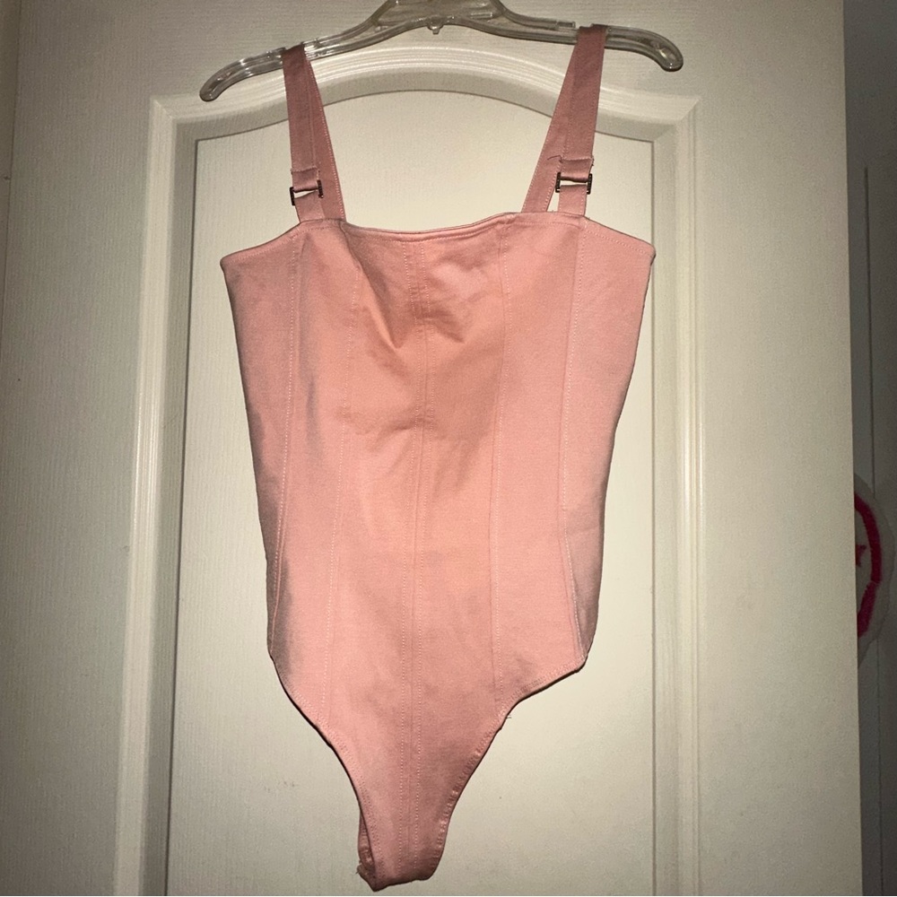GUESS bodysuit in size M